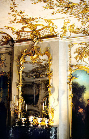 Gold adorns walls & mirrors inside Sanssouci Palace, Potsdam. - Click to read about this site.